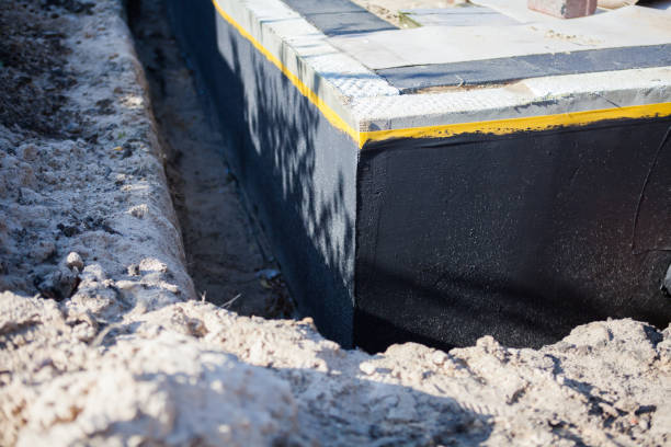 Professional Wet Basement Repair technician working in Alto, MI